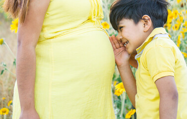 Fototapeta premium pregnancy, motherhood, people and expectation concept - close up of happy pregnant woman with big belly