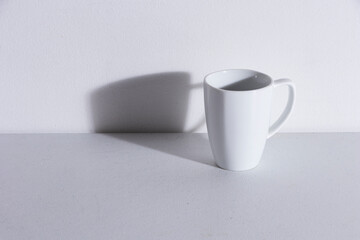 empty white mug with shadow