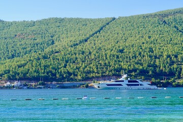 Panoramic view of Beach And Blue Lagoon, beach and turquoise ocean with white yachts is the best...