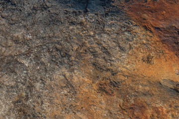 2020-12-01 ABSTRACT PHOTO OF A PIECE OF GRANTIE ROCK WITH GOLD TONES