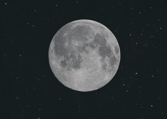 Fototapeta na wymiar Full moon in the starry night sky.