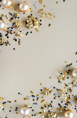 Christmas background . New Year decorations in gold colors on gold background. Top view. Copy space
