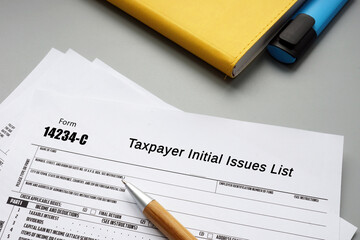 Business concept about Form 14234-C Taxpayer Initial Issues List with sign on the piece of paper.