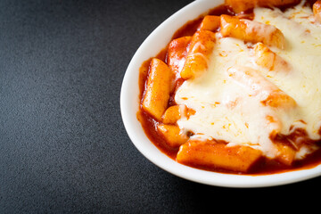 Korean rice cake in spicy Korean sauce with cheese, Cheese Tokpokki, Tteokbokki with Cheese