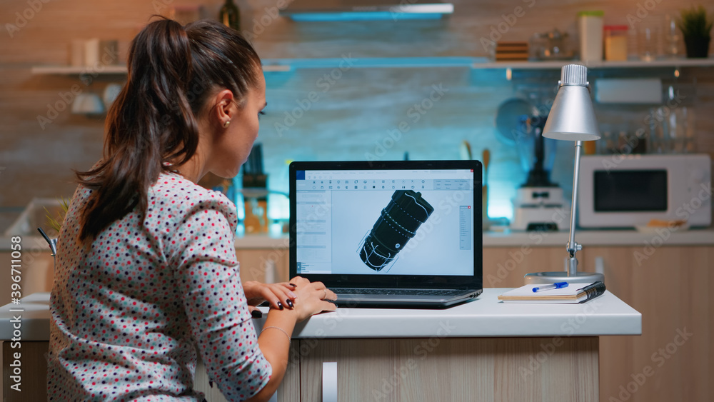 Poster designer engineer analizing new prototype of 3d model of the plant working from home. industrial fem