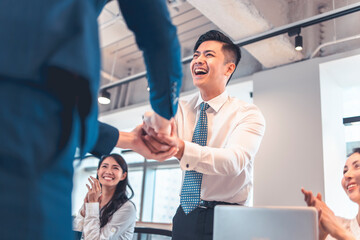 happy Business people shaking hands in conference room