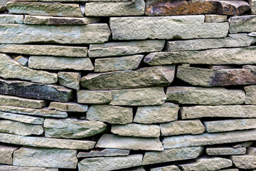 Pattern gray color of modern style design decorative uneven cracked real stone wall surface