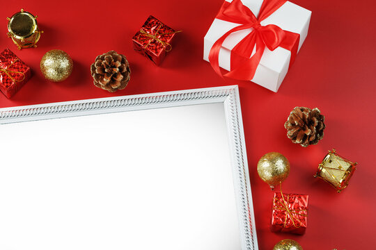 Layout of greeting cards with free space on a red background with their Christmas decorations.