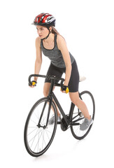 Female cyclist riding bicycle on white background