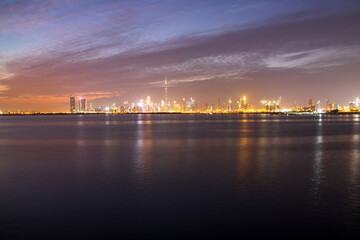 Fototapeta na wymiar Shot of a Dubai city skyline at night from Dubai creek harbour. UAE. Outdoors