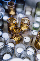 Top view to candle lights in the glass cups
