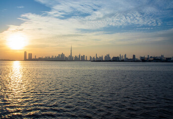 Naklejka premium Dramatic sunset over a Dubai city. UAE. Outdoors