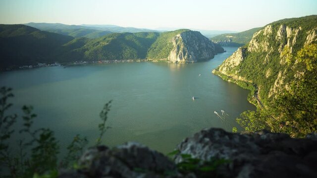 View of cazanele dunarii at sunset in the summer, we can see boats in the distance