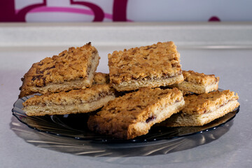 Viennese cookies close-up on a plate in the kitchen area.