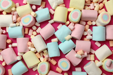 Sweet marshmallow on pink background, top view