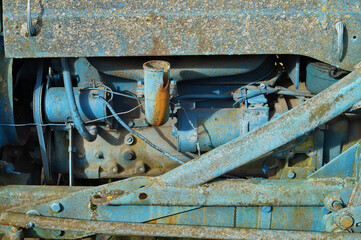 Rusty  vintage  small  tractors  diesel engine painted blue
