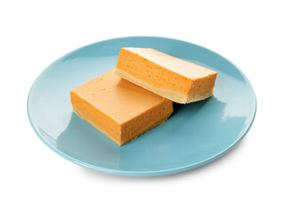 Plate with pieces of tasty pumpkin pie on white background