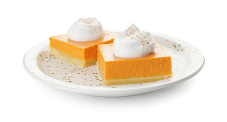 Plate with pieces of tasty pumpkin pie on white background