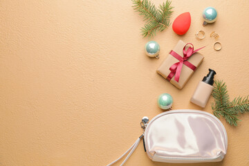 Christmas composition with cosmetics on color background