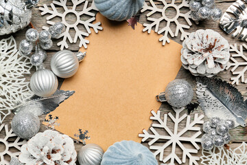 Beautiful Christmas composition with blank card on wooden background
