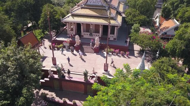 4K DRONE FOOTAGE PEOPLE AT WAT PHNOM TEMPLE, CAMBODIA