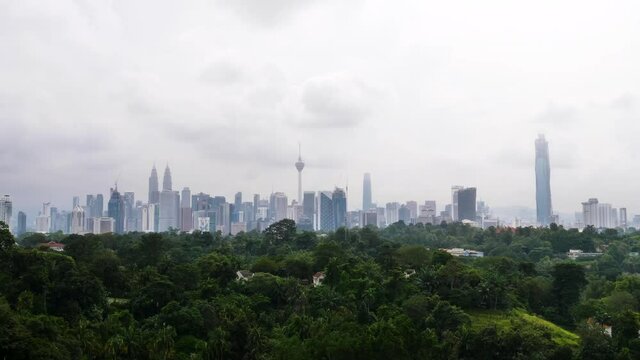 4K TIME-LAPSE KUALA LUMPUR SKYLINE VIEW FROM BUKIT TUNKU, MALAYSIA