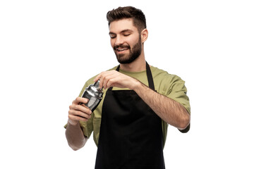 alcohol drinks, people and job concept - happy smiling barman with shaker preparing cocktail over white background
