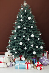decor new year and terrier beautiful Christmas tree with gifts