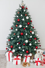 Decor new year interior beautiful Christmas tree with gifts