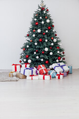 Decor new year interior beautiful Christmas tree with gifts