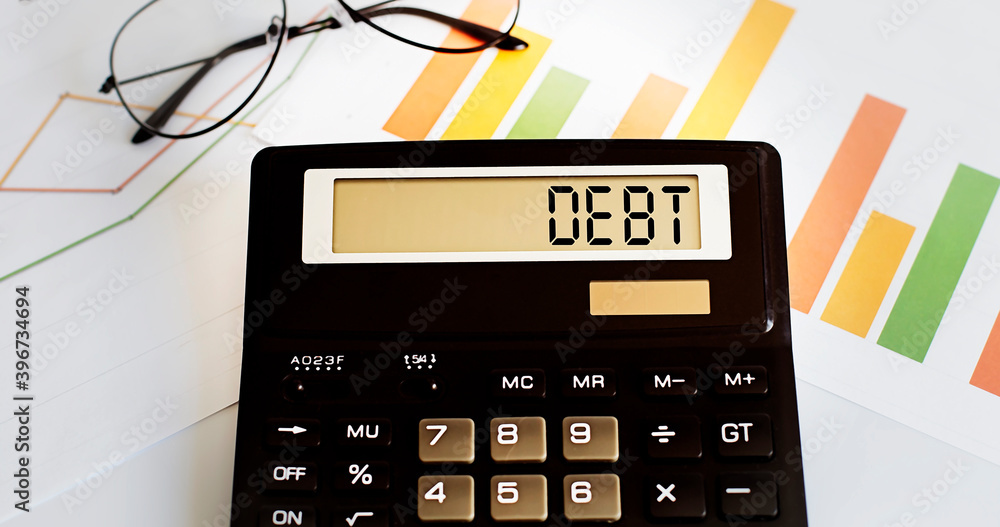 Aufkleber calculator with the word debt on the display with chart and glasses