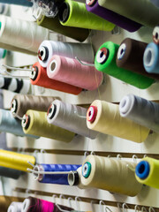 Colorful thread spools used in fabric and textile industry