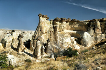 Unusually shaped cliffs of volcanic origin in the Pashabag Valley in the Cappadocia region in Turkey.