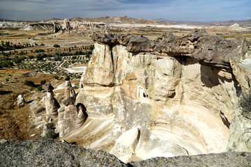 Unusually shaped cliffs of volcanic origin in the Pashabag Valley in the Cappadocia region in Turkey.