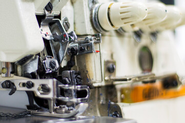 Mechanism of sewing machine, metal part of machinery.