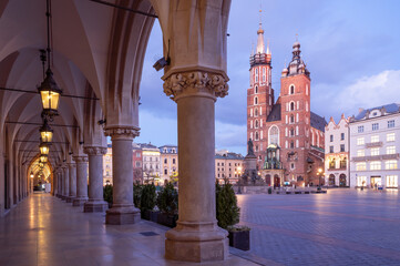Fototapeta na wymiar Krakow attractions in market square in the evening. Symbol of Krakow, Poland Europe.