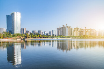 Fototapeta na wymiar High-rise residential buildings on the shore of Phoenix Lake Park, Nansha, Guangzhou