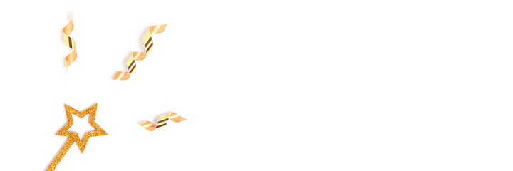 Banner with golden glittering magic wand in a star shape with confetti. Festive concept with copy space.