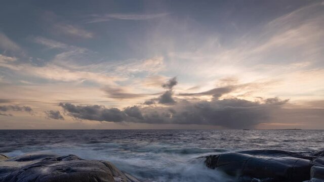 Rocky seacoast of Norway at winter sunset, time lapse video