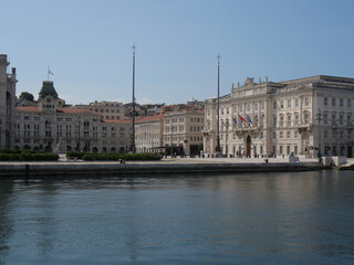 Fototapeta na wymiar Piazza Unità d'Italia in Trieste, panorama from Molo Audace of its buildings like Palace of Lloyd, Palace of the Austrian Lieutenancy and Town