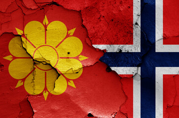 flags of Trondheim and Norway painted on cracked wall