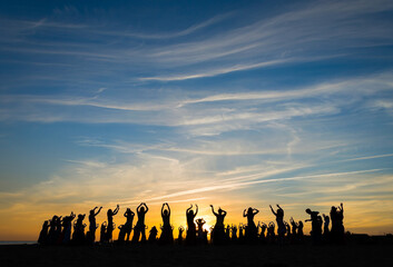 Ritual dance of women at sunset