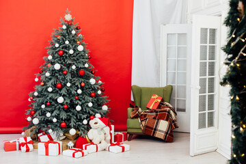 Red decor new year interior Christmas tree with gifts