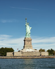 Beautiful view of Liberty Island in New York Bay, where you can see the famous Statue of Liberty,  and the Hudson River 