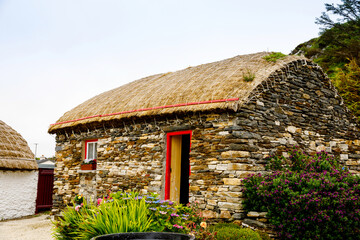 Fototapeta na wymiar Museum in Glencolumbkille, Donegal region of Ireland. Traditional old Irish houses.