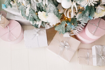 beautiful Christmas decorations and gifts under the Christmas tree	
