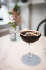 Cocktail espresso martini restaurant setting