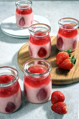 Strawberry Pudding on a glass decorated with fresh berries