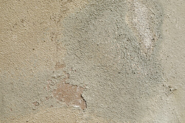 Weathered stone wall with monochrome peeled effect, rough stone structure, background with space for text