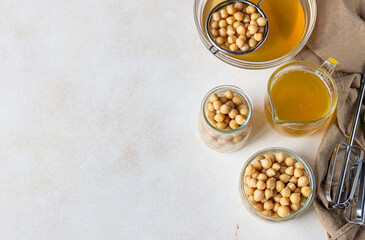 Boiled chickpea and aquafaba. Egg replacement for vegan recipe. Vegan cooking concept. Healthy product. Top view.